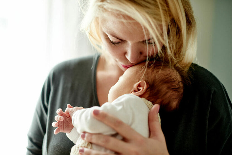 Your Guide to Treating Postpartum Hair Loss